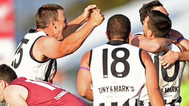 Norwood Payneham Union players celebrate their win. Picture: Tom Huntley