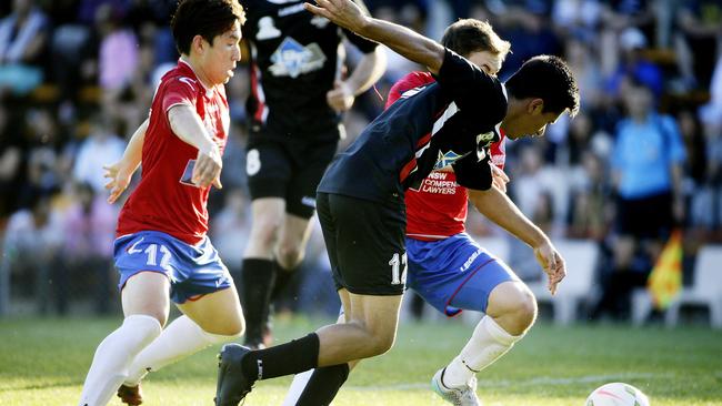 Bonnyrigg's Mu-soo Gil and Blacktown's Daniel Araujo battle for the ball.