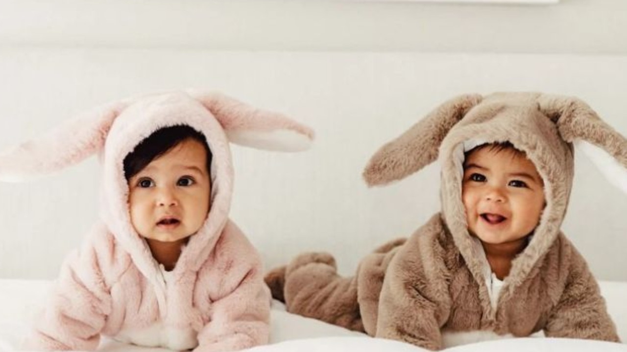 How cute are these Fox &amp; Finch Pink Faux Fur Bunny Onesies? Picture: THE ICONIC