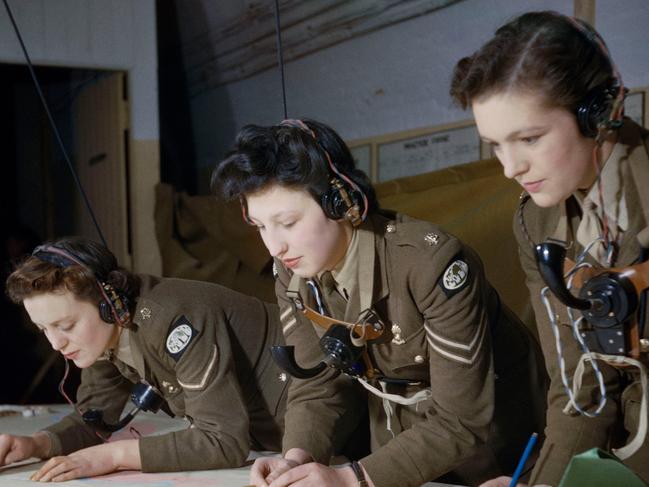 Second World War photos in colour -  Auxiliary Territorial Service (ATS) plotters at work at Coastal Artillery Headquarters in Dover, December 1942.  Picture: Imperial War Museum