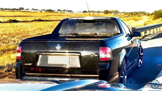 The black Holden Commodore ute in a more intact state when police caught up with Power-Williams after his dangerous driving in January. Picture: SA Police