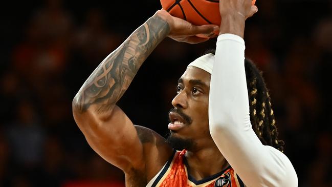 CAIRNS, AUSTRALIA - JANUARY 21:  Tahjere McCall  of the Taipans shoots during the round 16 NBL match between Cairns Taipans and Brisbane Bullets at Cairns Convention Centre, on January 21, 2024, in Cairns, Australia. (Photo by Emily Barker/Getty Images)