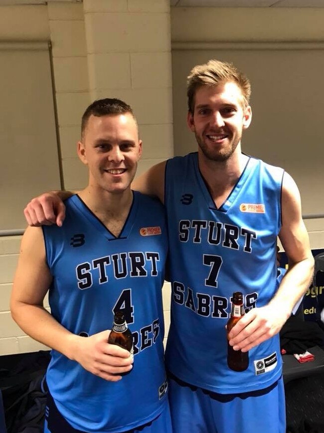 Retiring Sturt player Mark Bauer and teammate Tim Klaosen after Bauer’s farewell game. Picture: Supplied.