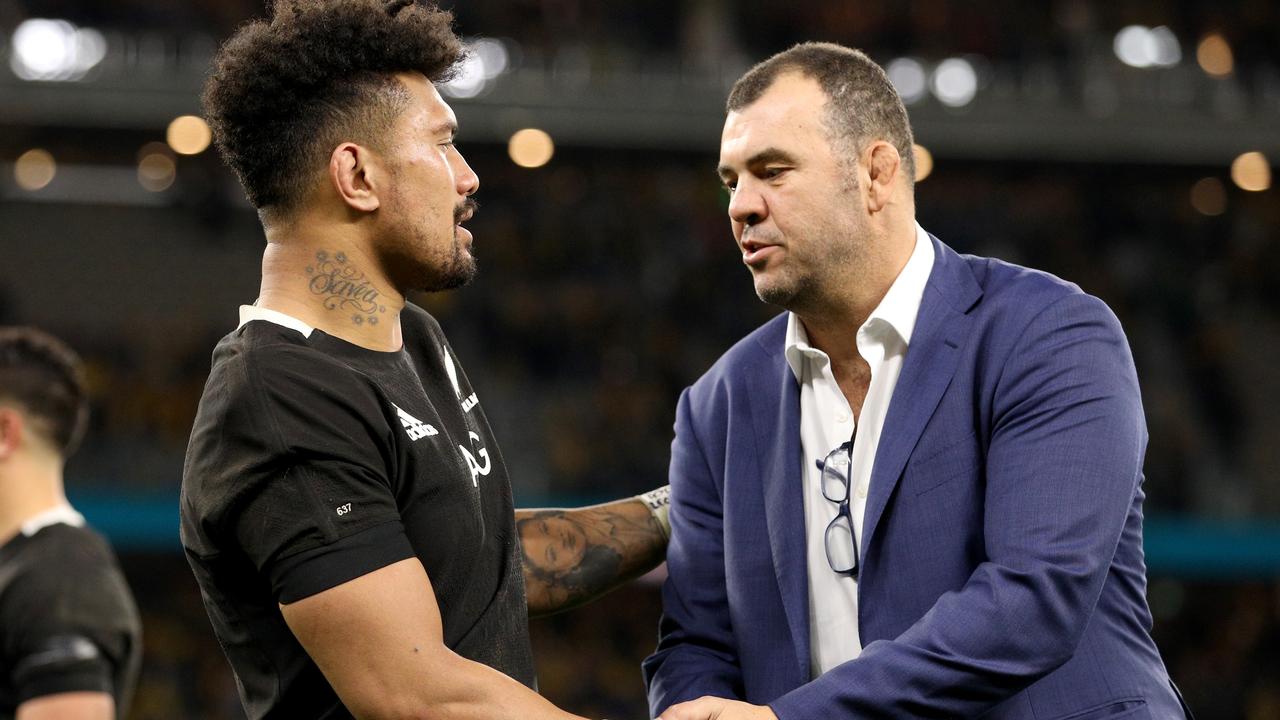 Michael Cheika speaks with Ardie Savea at the end of the Bledisloe Cup match.