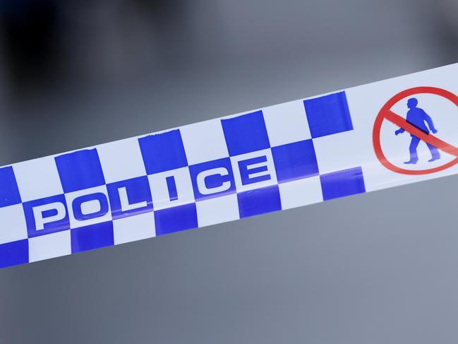 Generic image of police tape outside a crime scene on William Street in the Melbourne CBD on Wednesday, February 5, 2020. (AAP Image/James Ross) NO ARCHIVING