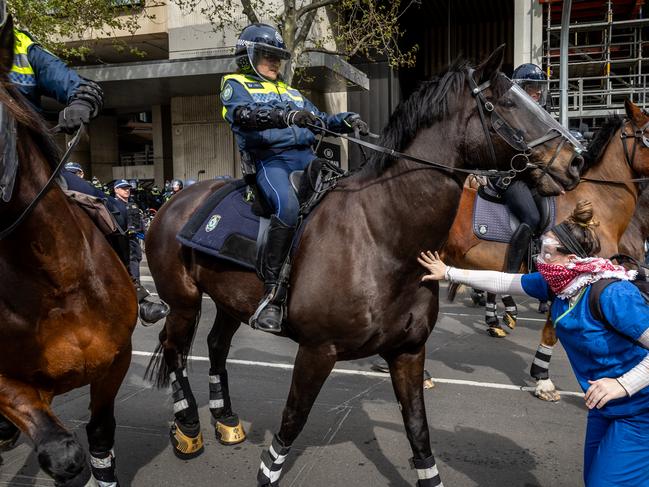 Victoria had to call in police officers from interstate to manage the thousands of protesters targeting the Land Forces Expo. Picture: Jake Nowakowski