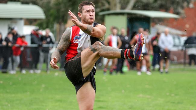 Now former St Kilda City player Aaron Edwards kicks for goal. Picture: George Sal