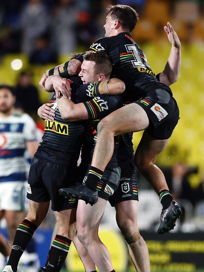 James Maloney is mobbed by teammates after his golden point field goal. Picture: Getty Images