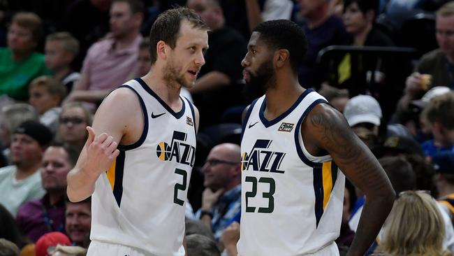 Joe Ingles talks to Utah Jazz and teammate Royce O'Neale against the Adelaide 36ers at Vivint Smart Home Arena. Picture: Gene Sweeney Jr./Getty Images/AFP