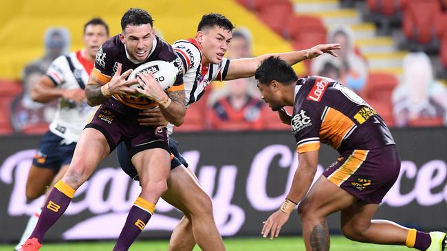 BRISBANE, AUSTRALIA - JUNE 04: Darius Boyd of the Broncos catches a high ball during the round four NRL match between the Brisbane Broncos and the Sydney Roosters at Suncorp Stadium on June 04, 2020 in Brisbane, Australia. (Photo by Bradley Kanaris/Getty Images)