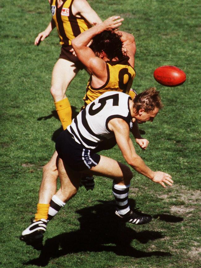 Gary Ablett crunches Robert DiPierdomenico.