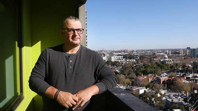 Garry Liakoureas takes in the view at the new Ozanam House in North Melbourne. Picture: Ian Currie