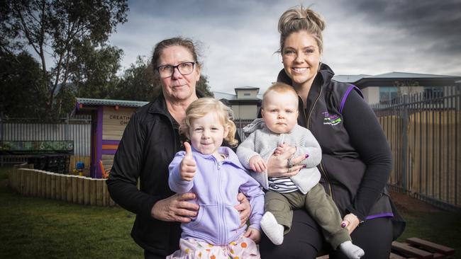 Tiny Tackers Children’s Centre director Cathy Leppard (left) and owner Erica Hendy with children Zara Coleman, 3 and Thomas Laycock, 9 months old. Picture: LUKE BOWDEN