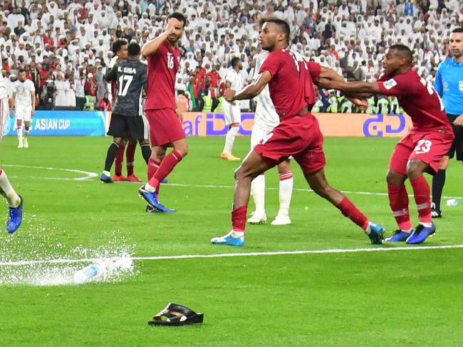 Flip flops fly as Qatar beats UAE