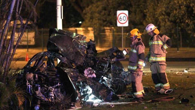 The car was unrecognisable after the accident on the Gold Coast Highway at Palm Beach. Picture Mike Batterham.