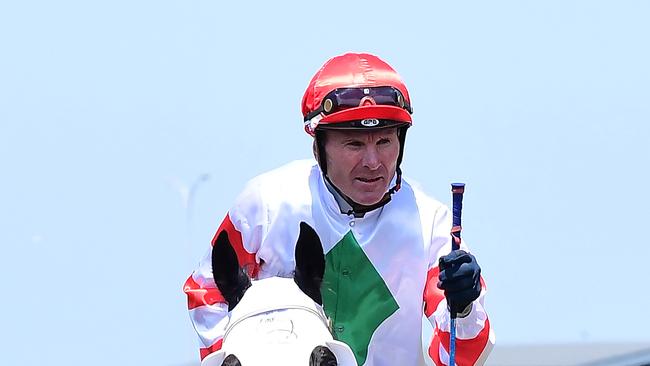 Jockey Paul Hamblin giving the fist pump after winning on Hard Stride. Picture: Grant Peters/Trackside Photography