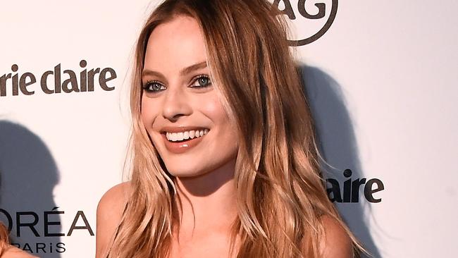 Margot Robbie makes her first post-wedding appearance at Marie Claire's Image Maker Awards.