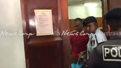 John Nikolic leaving court in Fiji