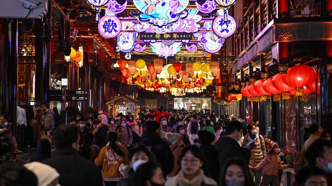 China’s financial hub of Shanghai is back in the swing as people prepare for their first Lunar New Year celebrations in four years. Picture: AFP