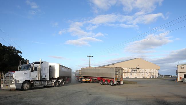 “Stark difference” this year’s bumper rice harvest means trucks are coming and going all day at the SunRice Mill, Deniliquin, NSW, a big change from the last two years of smaller harvests. Picture: Yuri Kouzmin