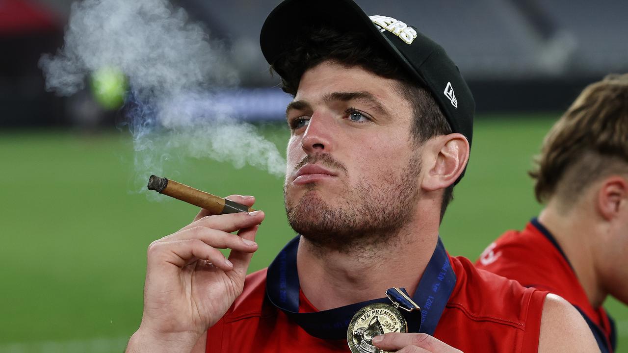 Angus Brayshaw celebrates with a cigar in the middle of Perth Stadium two hours after the final siren. Picture: Michael Klein