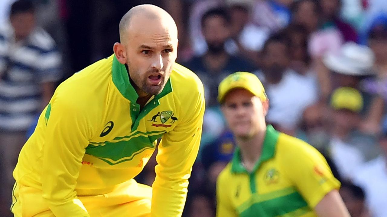 Australia's Nathan Lyon fields a ball during the first one day international.