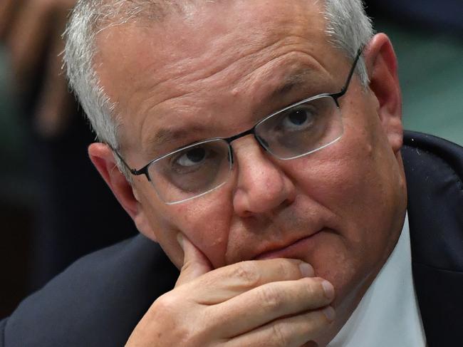 CANBERRA, AUSTRALIA - MARCH 25: Prime Minister Scott Morrison during Question Time in the House of Representatives at Parliament House on March 25, 2021 in Canberra, Australia. The federal government was on Monday set back by new allegationsÃÂ broadcastÃÂ by the Ten Network after pixelated images of unnamed Coalition advisers allegedly engaging in performing lewd sex acts on the desks of female MPs resulting in a Morrison staff member being sacked last night. Additionally, the ABC Network aired a first hand account by an Australian Parliament security guard of what she witnessed on the night Brittany Higgins was allegedly raped in the office of then-defence industry minister Linda Reynolds in early 2019. (Photo by Sam Mooy/Getty Images)