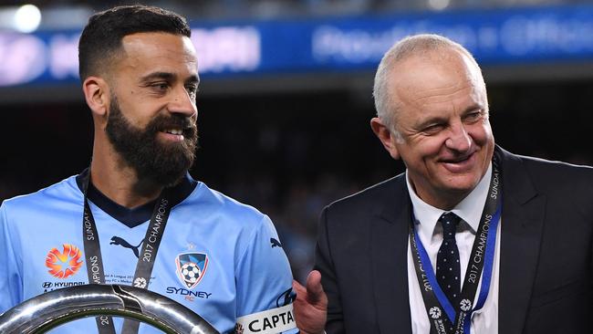 Sydney FC captain Alex Brosque and coach Graham Arnold at the grand final presentation.