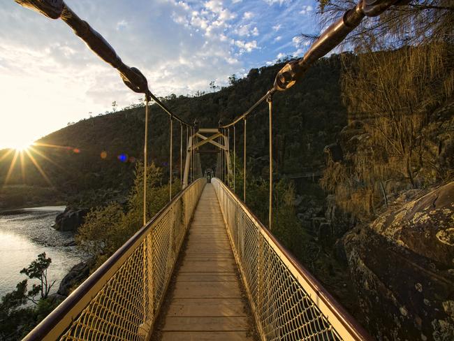 The Suspension Bridge at Launceston’s tranquil and naturally beautiful Cataract Gorge Reserve. Picture: TOURISM TASMANIA &amp; ROB BURNETT