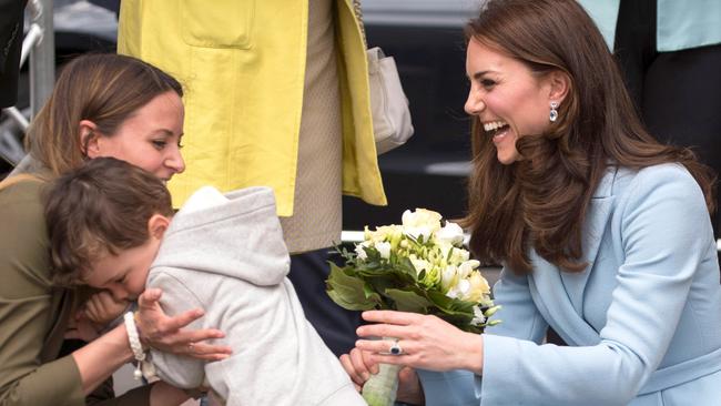 Kate Middleton: Little boy presents royal with flowers, then hides ...