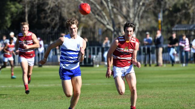 College Football Grand Final - St Peters College v Prince Alfred College photographed at Kent Town, Adelaide on Saturday the 25th of August 2018.  SP - #10 Charlie Gibson v PAC #17 Tom Sumner(AAP/ Keryn Stevens)