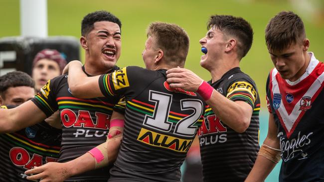 The Panthers celebrate Luron Patea’s try against the Roosters. Picture: Julian Andrews