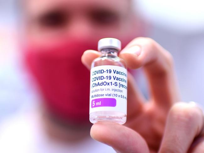 BRISBANE, AUSTRALIA - NewsWire Photos - AUGUST 8, 2021. Pharmacist Michael Thorp holds a vial of the AstraZeneca Covid-19 vaccine the at the Carina Day and Night pharmacy in Brisbane. Picture: NCA NewsWire / Dan Peled