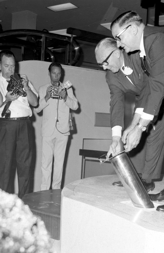 The time capsule being placed into the ground. Picture by Bob Avery Supplied from Gold Coast Libraries Local Studies Collection