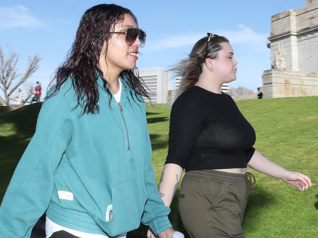 These two women received fines from police for not wearing masks after an anti-mask protest at the Shrine of Remembrance. Picture: NCA NewsWire / David Crosling