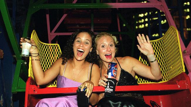 31 Dec 2002 New Year's Eve celebrations - Ellen Roosmale-Cocq and Andrea Walters ride in a Ferris Wheel at the City Hall in Brisbane picDerek/Moore revellers