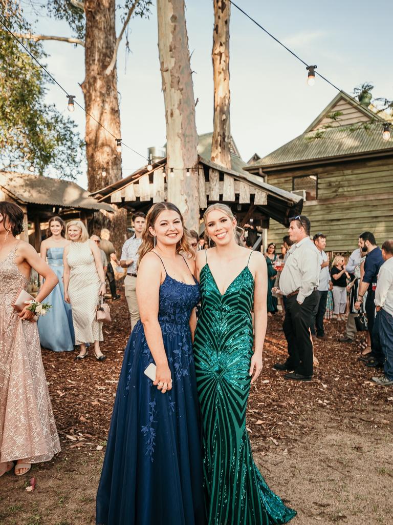 Glasshouse Christian College students Anaya White and Isabel Holley enjoy the country surrounds during the pre-formal drinks with family and friends. Picture: Jordan Bull