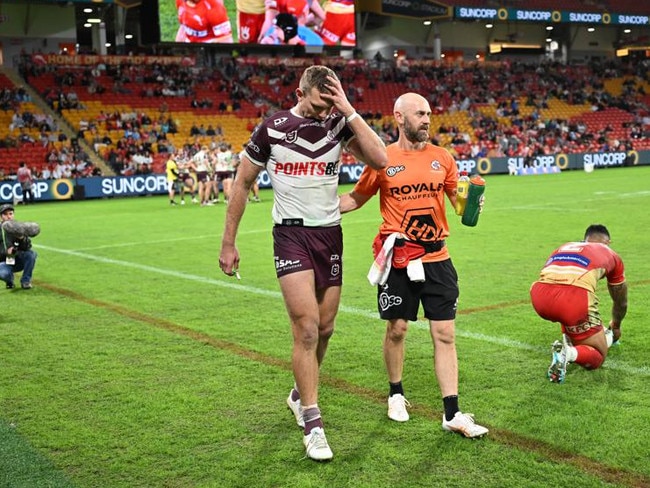 Manly star Tom Trbojevic leaves the field with a hamstring injury. Credit: NRL Images.