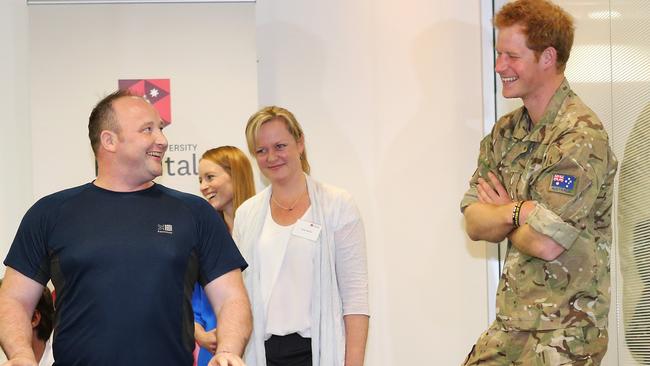 HRH Prince Harry of Wales visits Macquarie University Clinic. Prince Harry visits Lt Ali Spearing, a Royal Engineers Officer who was badly wounded losing both legs above the knees while on deployment in Afghanistan in 2011. Technology Place, Macquarie University Clinic.