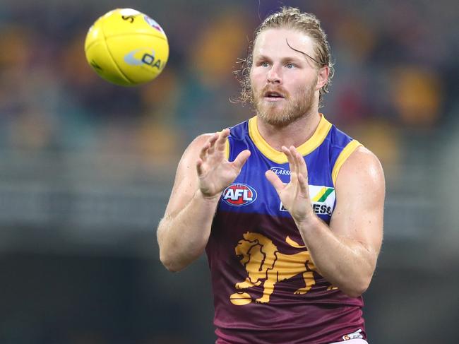 GOLD COAST, AUSTRALIA - JUNE 20: Daniel Rich of the Lions catches during the round 3 AFL match between the Brisbane Lions and the West Coast Eagles at Metricon Stadium on June 20, 2020 in Gold Coast, Australia. (Photo by Chris Hyde/Getty Images)