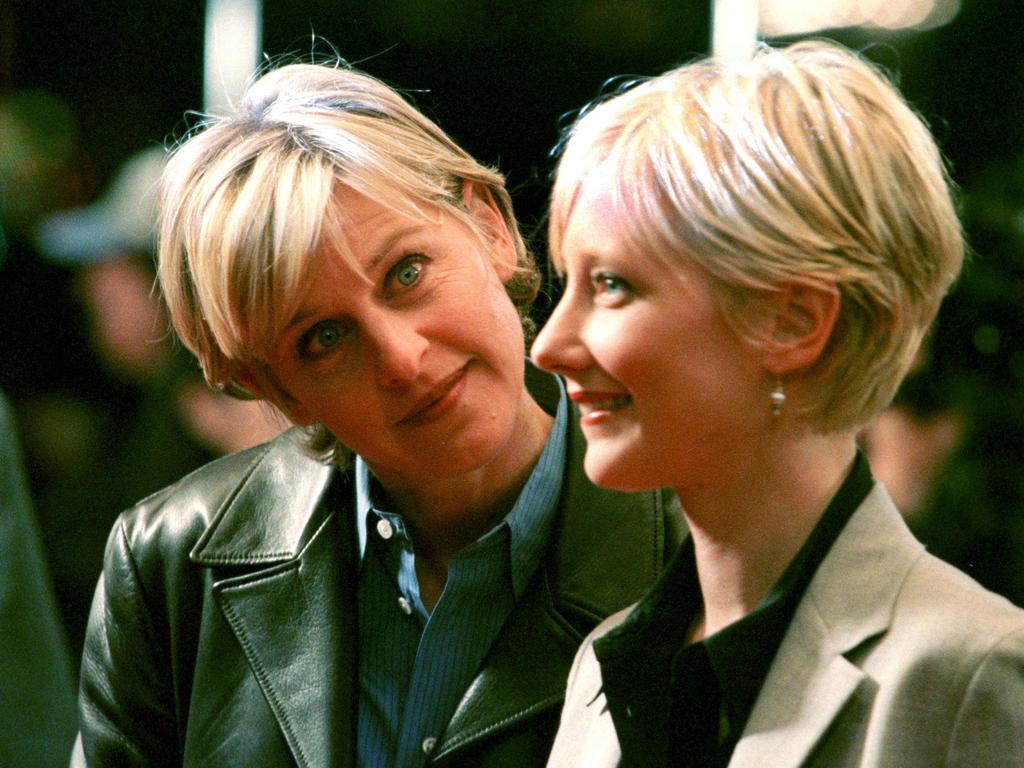 (FILES) In this file photo taken on February 10, 1998 US television actress Ellen Degeneres (L) arrives with her girlfriend-actress Anne Heche (R)attend the premiere of "Sphere" at the Mann's Village Theater in Westwood, California. - US actress Anne Heche has been hospitalized in critical condition after crashing her car into a Los Angeles home, US media reported Friday. The Los Angeles Fire Department reported that a vehicle struck a two-story house in Los Angeles' Mar Vista neighborhood, "causing structural compromise and erupting in heavy fire." (Photo by HECTOR MATA / AFP)