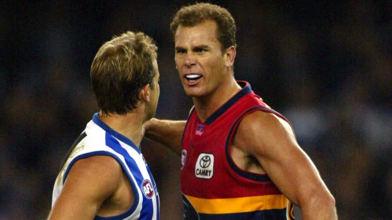 Carey and Stevens clash during the Kangaroos versus Crows game at Telstra Dome in 2003. Picture: Colin Murty