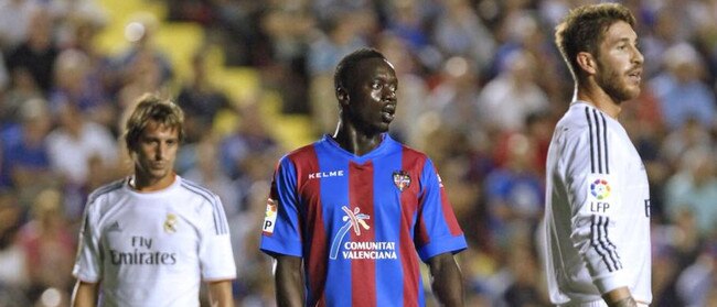 Baba Diawara during his time in Spain, facing Spanish international and Real Madrid legend Sergio Ramos.