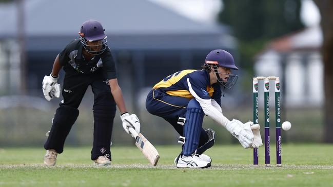 Charlestown’s Aarham Shah and Merewether's Clancy Moore. Picture: Michael Gorton