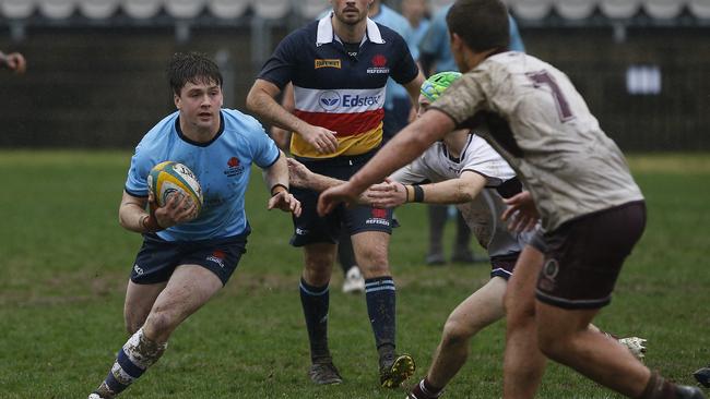 NSW's Nick Lamming with the ball.