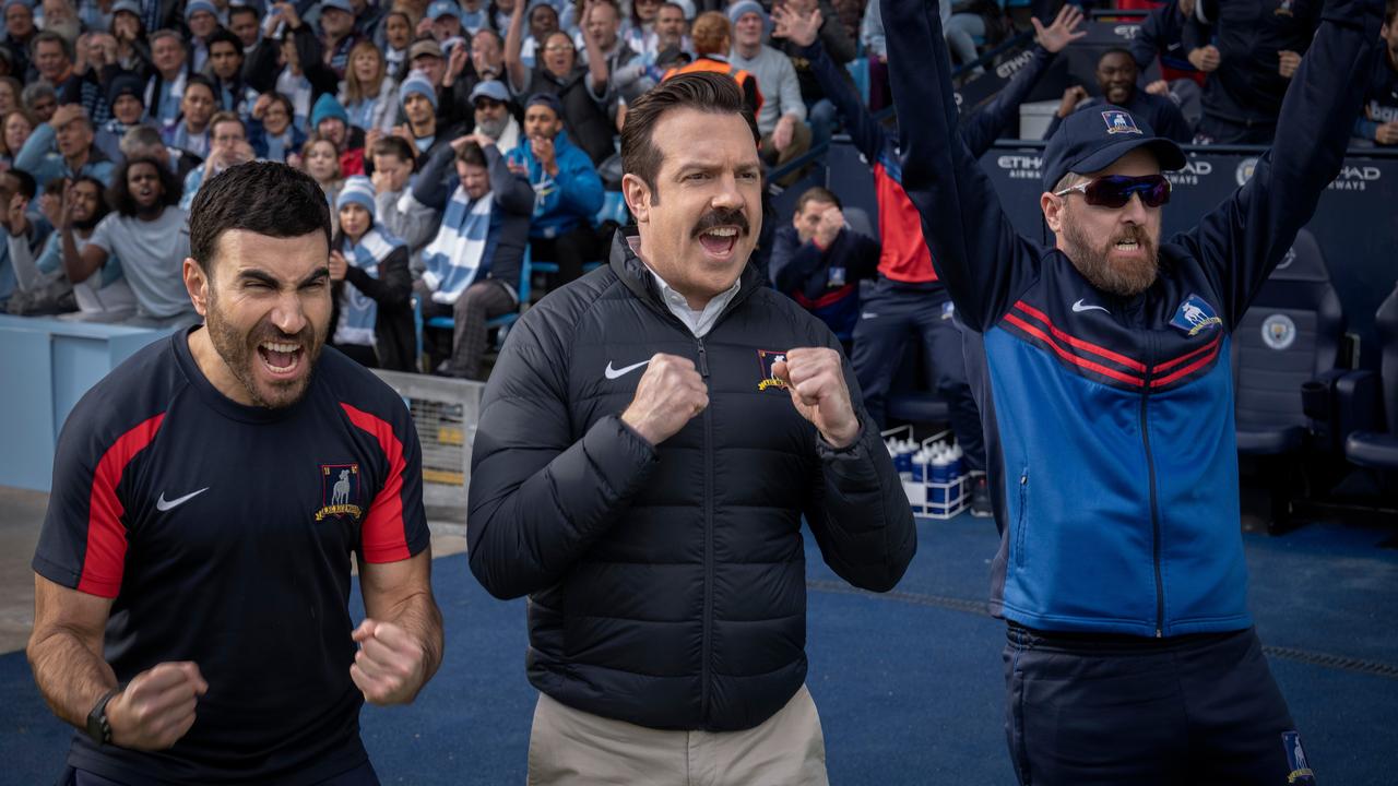 Jason Sudeikis as Ted Lasso (centre) with co-stars and co-writers Brett Goldstein (left) and Brendan Hunt (right).