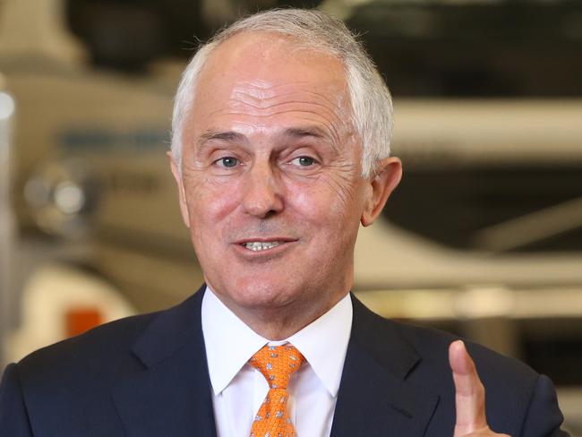 Federal Election 2016 19/5/16: Day 11 of the Federal Election campaign. Speaking in front of large trucks and tanks as Prime Minister Malcolm Turnbull, tours the Omni Tanker factory, member, here in the federal seat of Macathur, Smeaton Grange, western Sydney. Pic Lyndon Mechielsen/News Corp.