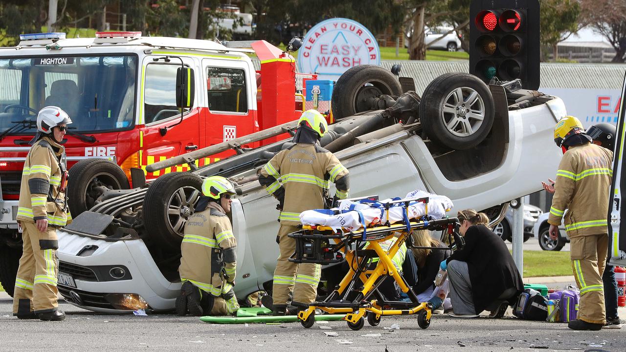 A car has flipped on its roof after a crash in Waurn Ponds on Wednesday. Picture: Alison Wynd