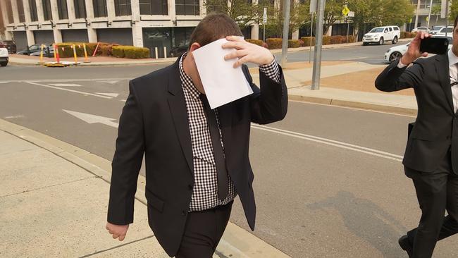 James Stuart Logue, 29, leaves the ACT Magistrates Court. He is accused of using Tinder to attempt to procure child prostitutes in Thailand. Picture: Craig Dunlop