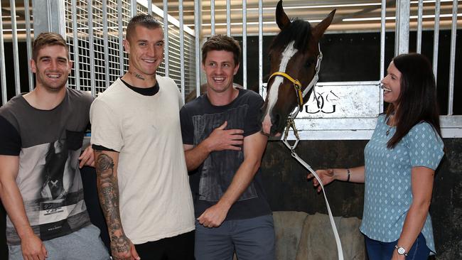 Richmond stars Anthony Miles and Dustin Martin and assistant coach Andrew McQualter are among 30 part-owners of Derby contender Main Stage. Picture: George Salpigtidis